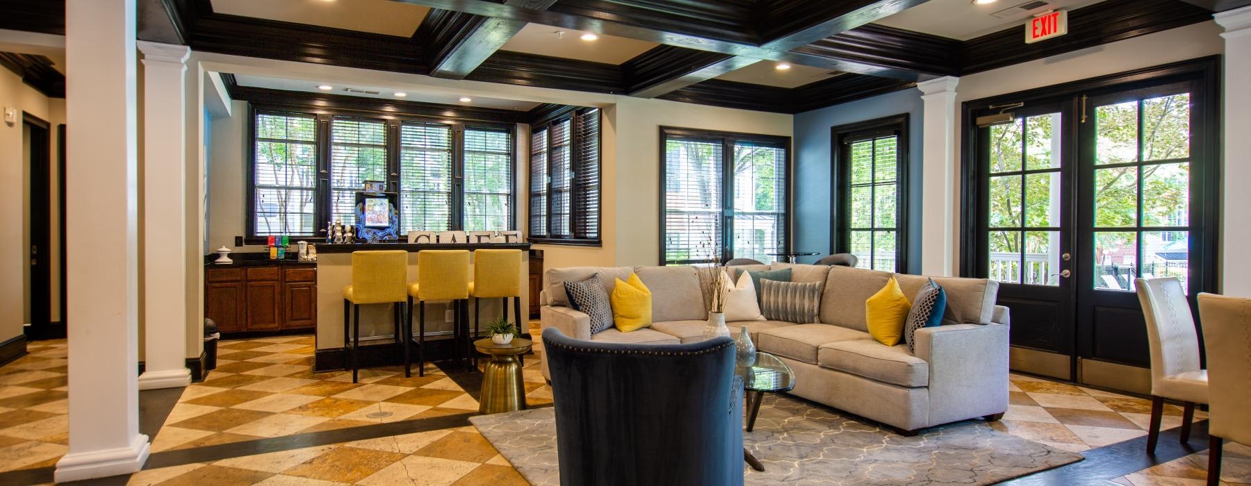 a large room with a couch and chairs